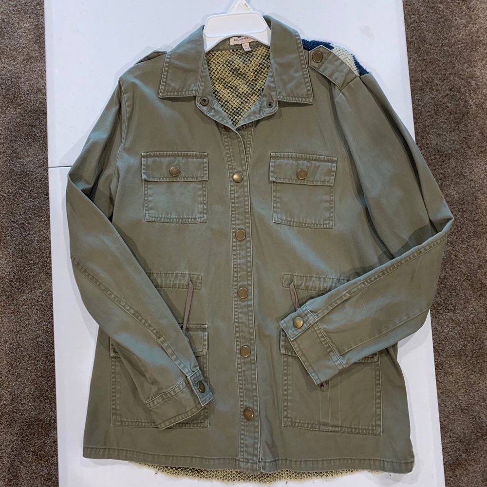 Army green jacket with blanket design on back